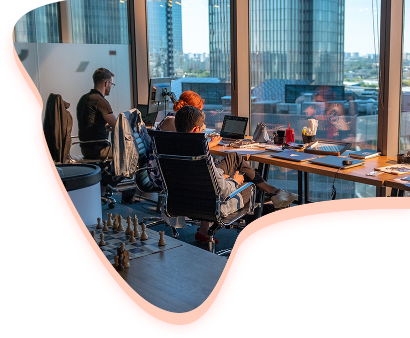 Furthermore team working in a bright office with city views
