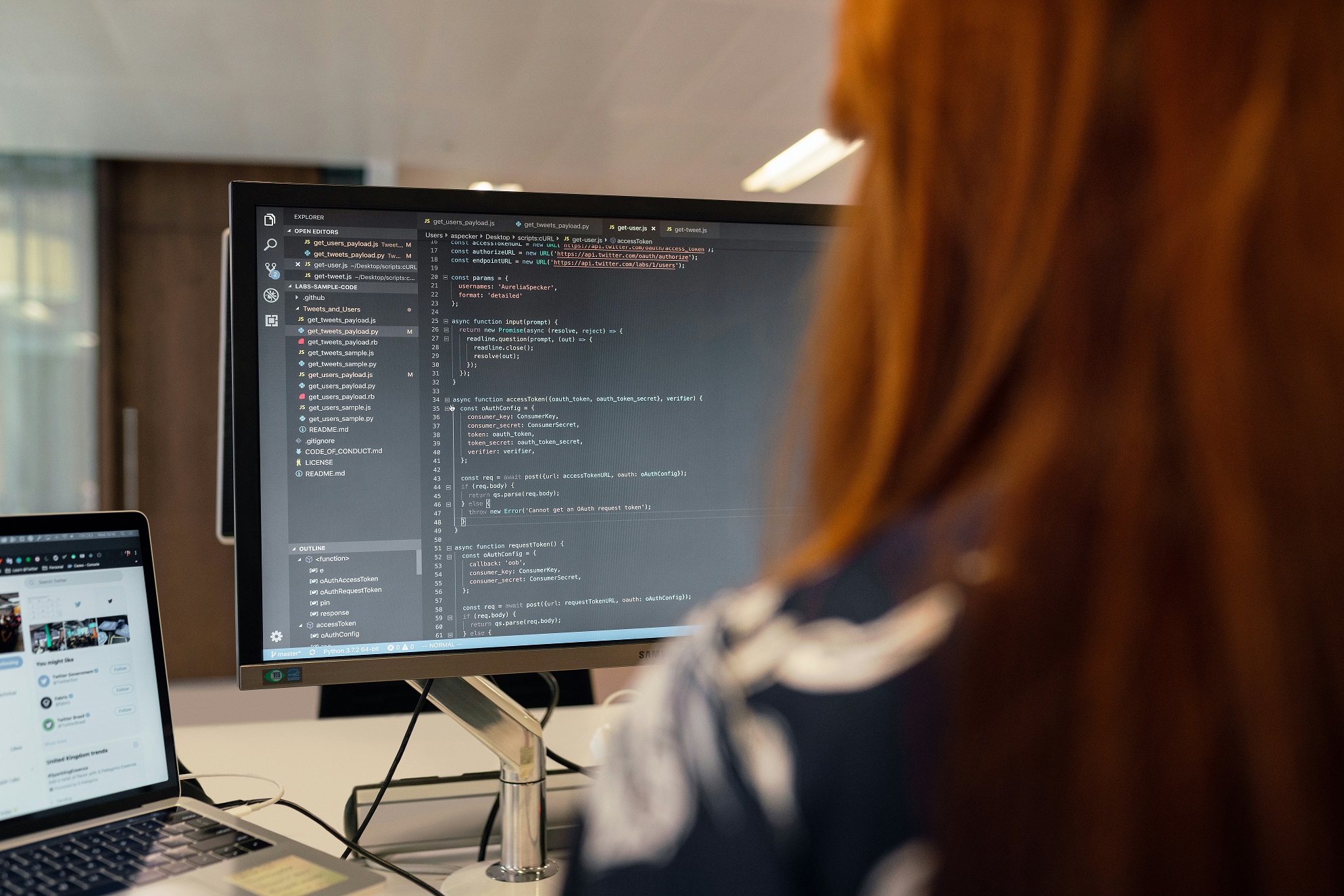 Engineer reviewing secure product architecture on a code screen
